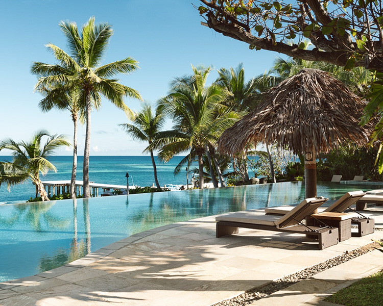 Relax by the pool at Tokoriki Island Resort - image courtesy of Tokoriki Island Resort.